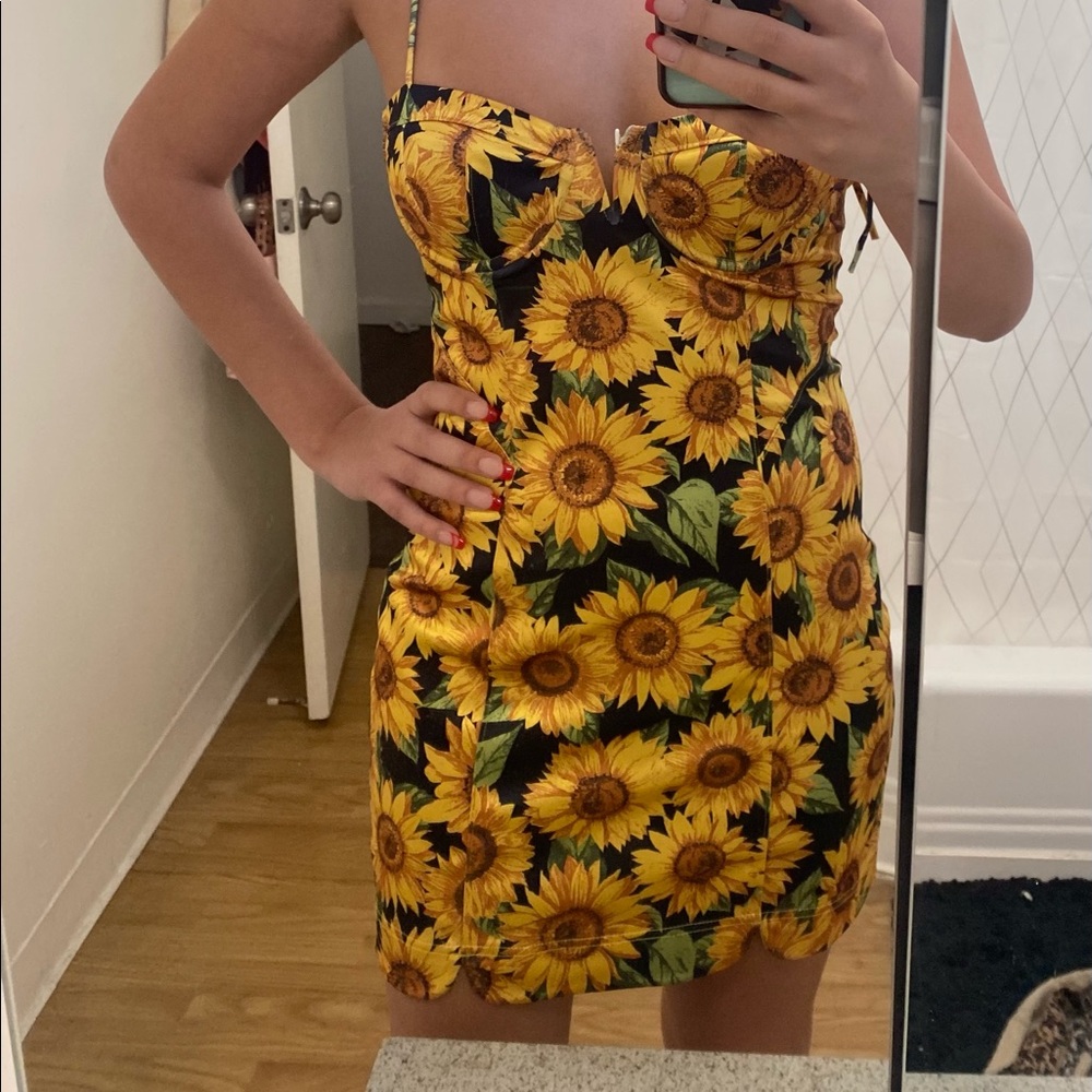 Custom sunflower printed dress.Size small,lightly worn. Breast wire popping out.